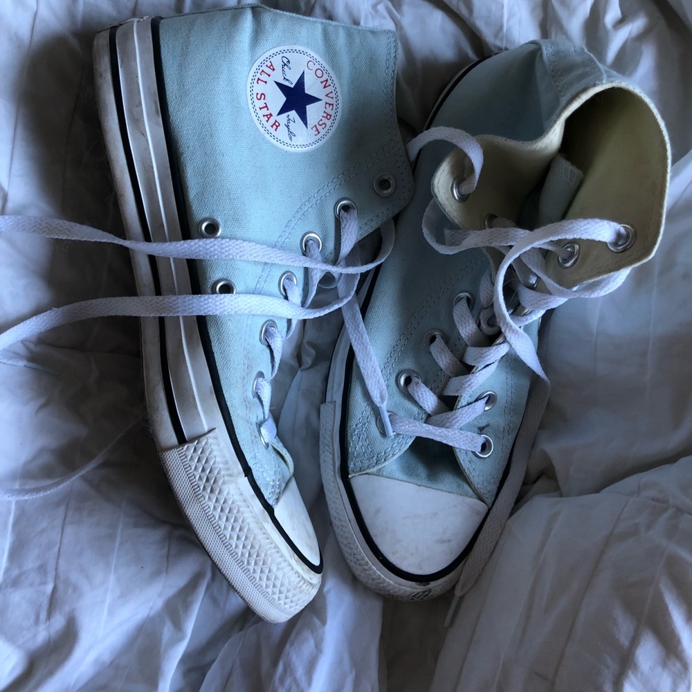 Light blue high top converse